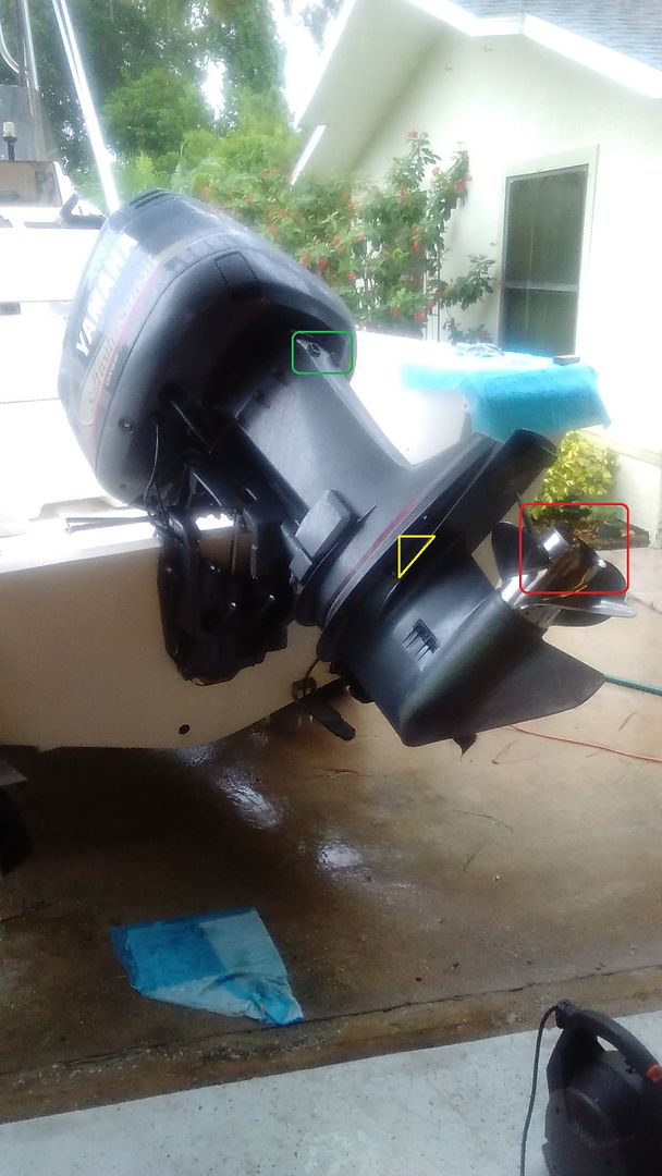 water-coming-out-of-upper-exhaust-on-outboard-motor
